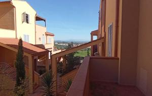 a view from the balcony of a building at twins home in Castiglione della Pescaia