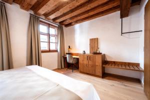Postelja oz. postelje v sobi nastanitve Hotel Traube Rattenberg