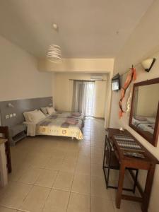 Gallery image of Spiros & Maria Hotel in Agios Stefanos +6 photos