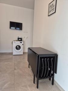 A kitchen or kitchenette at Sicily Neapolis Apartment & Rooms