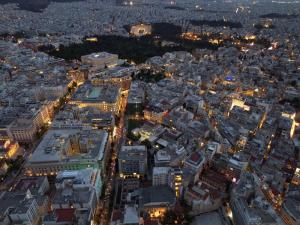 an aerial view of a city at night at Syntagma Center Suite by Zeus Suites in Athens