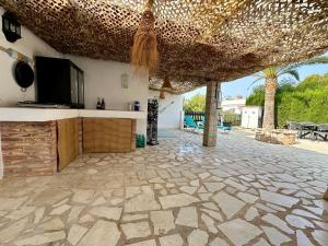Televízia a/alebo spoločenská miestnosť v ubytovaní Casa Con Vista -Luxury villa in Moraira