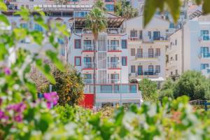 a group of apartment buildings in a city at Hotel No37 in Kaş