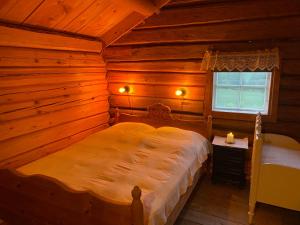 Postel nebo postele na pokoji v ubytování Gårdsturisme Sønstebø + 37 fotografií