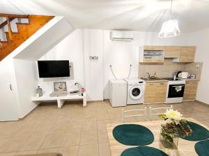 A kitchen or kitchenette at traditional suburbs maisonette