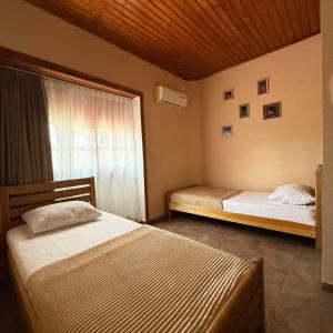 Postel nebo postele na pokoji v ubytování Babilina B&B