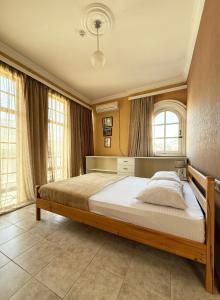 Postel nebo postele na pokoji v ubytování Babilina B&B