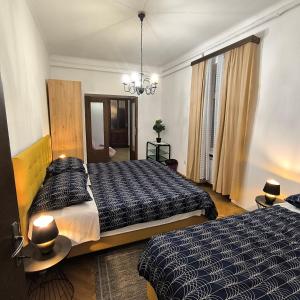 Postel nebo postele na pokoji v ubytování Apartments Aurora