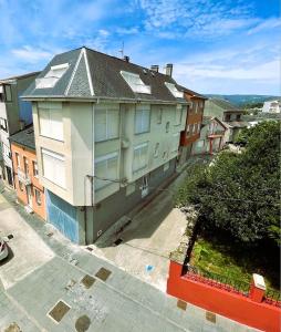 an overhead view of a building in a city at EnVIVEIRO Villa Bonita in Viveiro