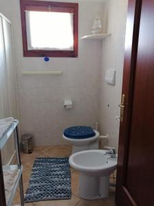 Koupelna v ubytování Moys apartment sea view olbia