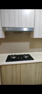 Η κουζίνα ή μικρή κουζίνα στο Homestay Mutiaraville cyberjaya