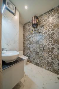Koupelna v ubytování Perfectstayz Aalaya suites
