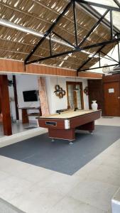 a large room with a pool table in it at Villa Padi Pakem in Pakem +122 photos