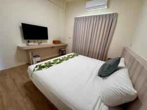 Ένα ή περισσότερα κρεβάτια σε δωμάτιο στο Mo Bi +3 φωτογραφίες