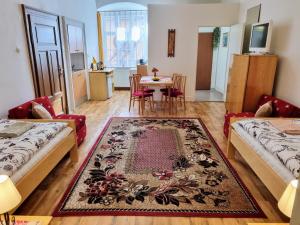 Posteľ alebo postele v izbe v ubytovaní Apartment in a historical house in the center of Levoča
