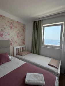 Cama o camas de una habitación en Pine&Sea Beach Retreat