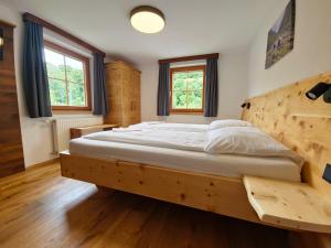 Łóżko lub łóżka w pokoju w obiekcie Landhotel Lacknerhof