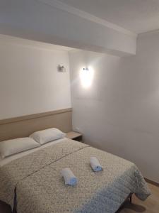 Postel nebo postele na pokoji v ubytování Motel Jadranka