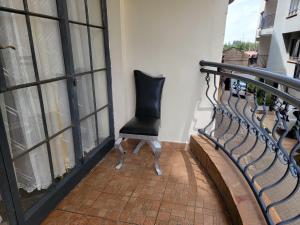 Balkón nebo terasa v ubytování Cozy Apartment