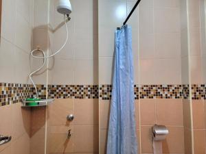 Koupelna v ubytování Cozy Apartment + 29 fotografií