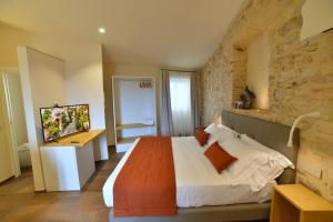 Postel nebo postele na pokoji v ubytování Rooms in Spello