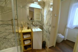 Koupelna v ubytování Rooms in Spello