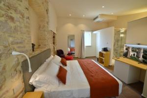 Postel nebo postele na pokoji v ubytování Rooms in Spello
