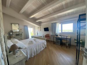 Postel nebo postele na pokoji v ubytování Villa Giusy