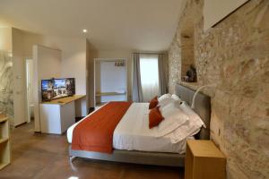 TV a/nebo společenská místnost v ubytování Rooms in Spello