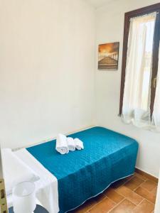 Ένα ή περισσότερα κρεβάτια σε δωμάτιο στο Casa Antonietta +6 φωτογραφίες