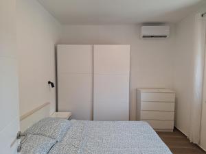 Postel nebo postele na pokoji v ubytování Apartman Damir