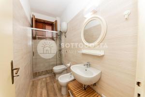 Koupelna v ubytování Il Bacio del Sole - San Foca + 30 fotografií