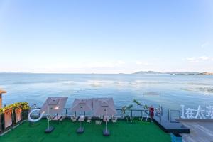 Φωτογραφία από το άλμπουμ του DreamHouse梦想家湖景民宿 στο Σουτσόου