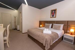 Alko Hotel Shkoder客房内的一张或多张床位