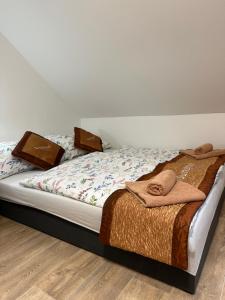 Postel nebo postele na pokoji v ubytování Sunshine Pension + 61 fotografií