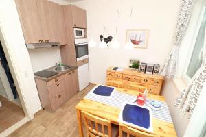 Kuchyň nebo kuchyňský kout v ubytování Apartments Trstenica
