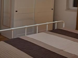 Postel nebo postele na pokoji v ubytování Apartments Trstenica