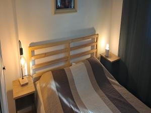 Postel nebo postele na pokoji v ubytování Apartments Trstenica
