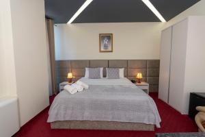 Alko Hotel Shkoder客房内的一张或多张床位