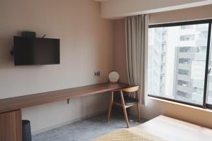 TV a/nebo společenská místnost v ubytování ICHIYU HOTEL ASAKUSA + 37 fotografií