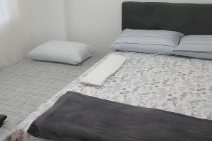 Postel nebo postele na pokoji v ubytování Apartamento do centro