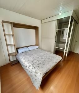 Postel nebo postele na pokoji v ubytování Apartamento do centro