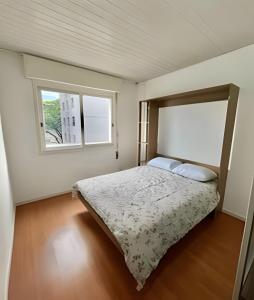 Postel nebo postele na pokoji v ubytování Apartamento do centro
