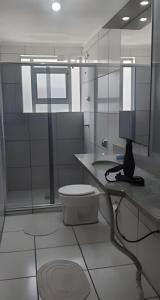 Koupelna v ubytování Apartamento do centro