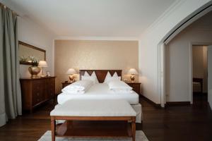 Postel nebo postele na pokoji v ubytování Hotel Hanswirt