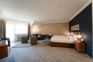 Postel nebo postele na pokoji v ubytování Hotel Hanswirt