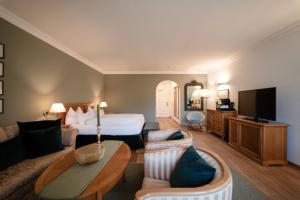 TV a/nebo společenská místnost v ubytování Hotel Hanswirt