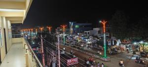 a view of a city at night with lights at R K Lodge & Mini Function Hall in Singarāyakonda