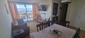 TV a/nebo společenská místnost v ubytování Departamento Villarrica Vista al Lago y Volcanes