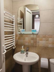 Koupelna v ubytování MANGO Guesthouse + 37 fotografií